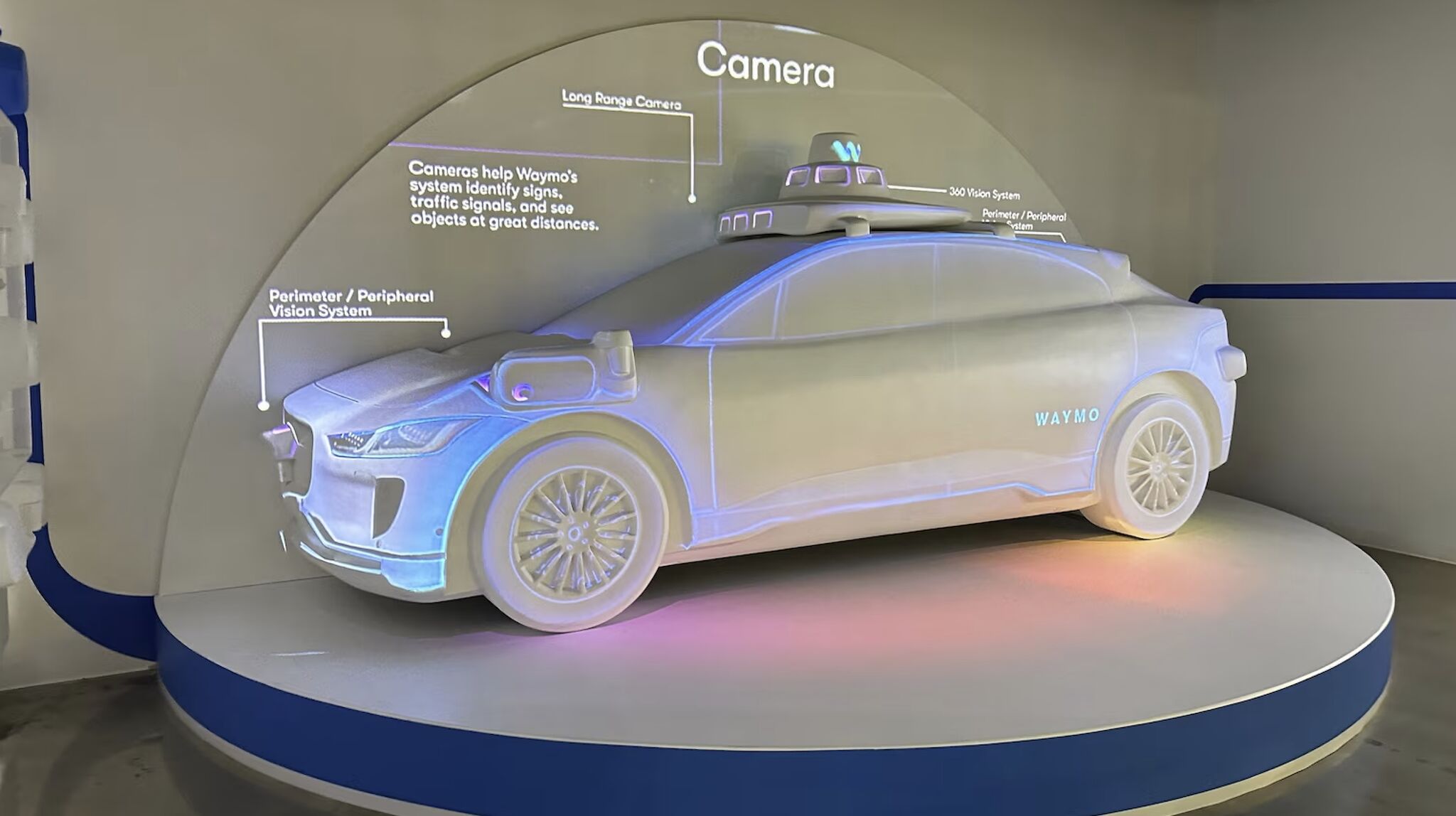 The robots arrive, and human drivers take a 6.9% pay cut.